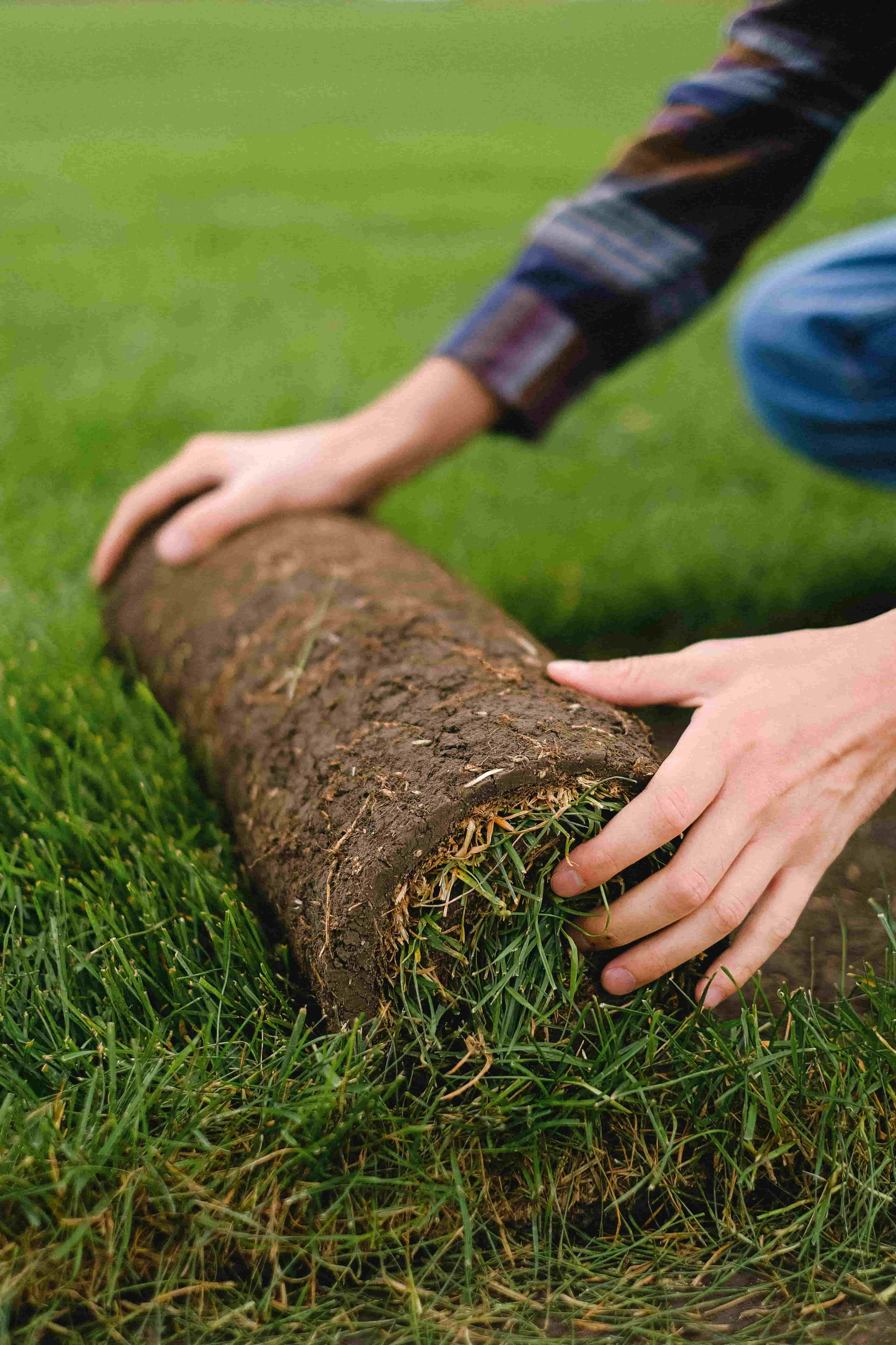 Excavation and compacted base preparation for artificial turf installation